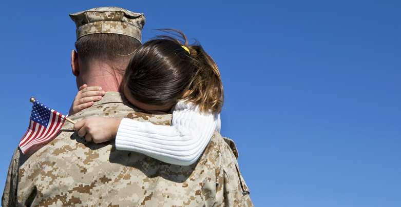 Soldier Hugging Daughter